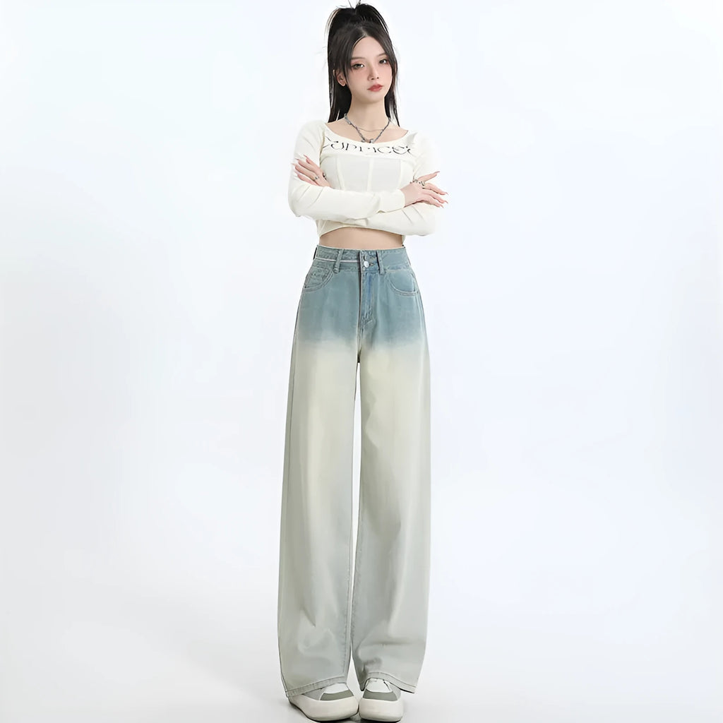 Women's gradient blue straight-leg denim trousers with wide leg design showing colour transition effect