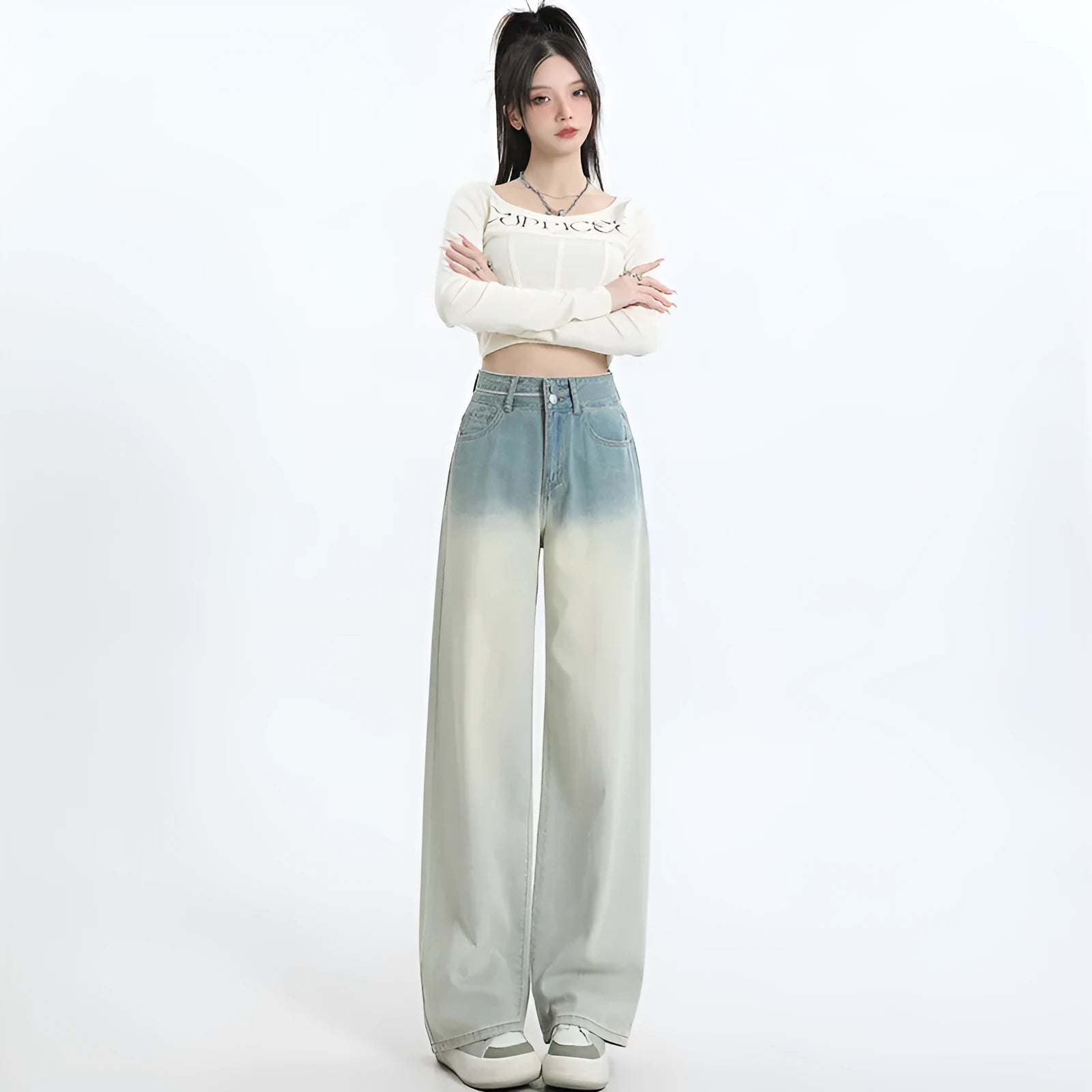 Women's gradient blue straight-leg denim trousers with wide leg design showing colour transition effect