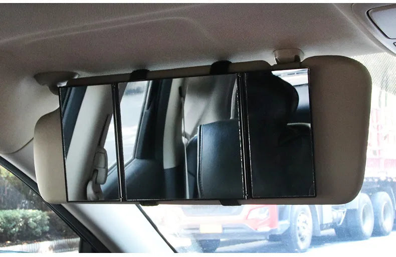 Silver car folding makeup mirror shown open and closed, demonstrating its size change.