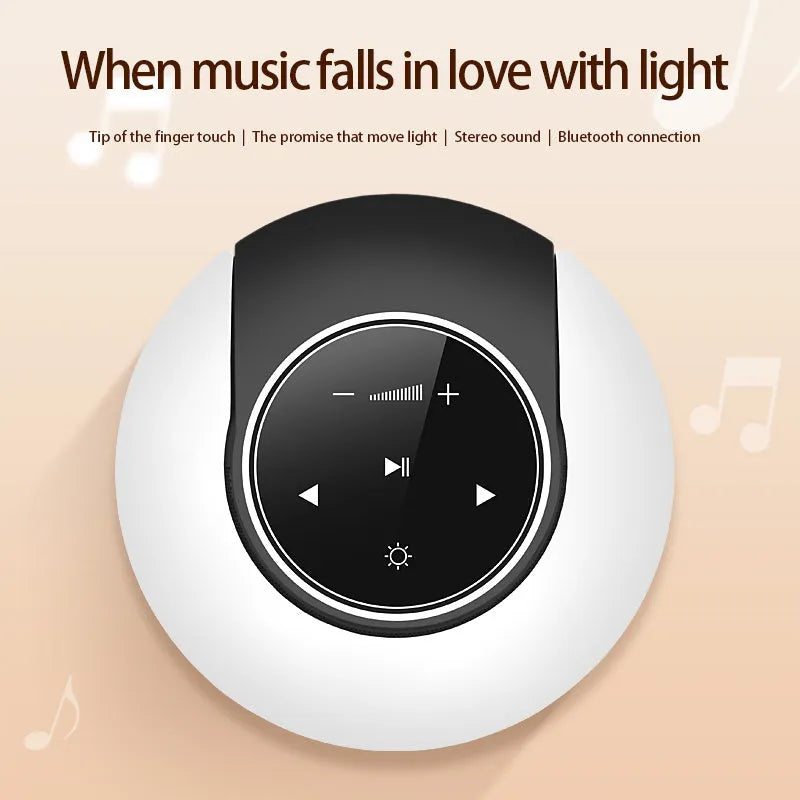 Creative folding Bluetooth speaker and LED desk lamp with touch controls on a desk.