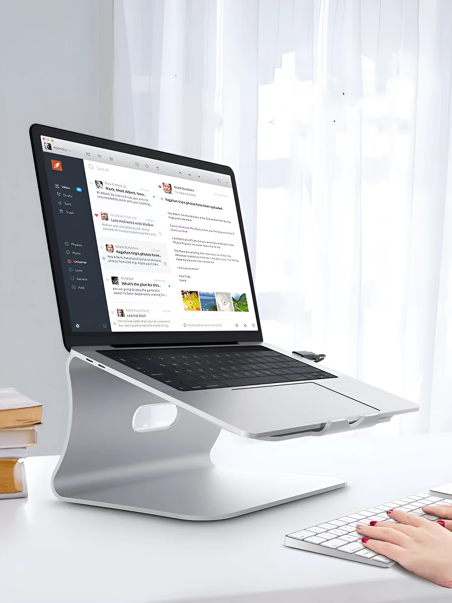 Silver aluminium alloy rotary cooling bracket for laptop on a desk