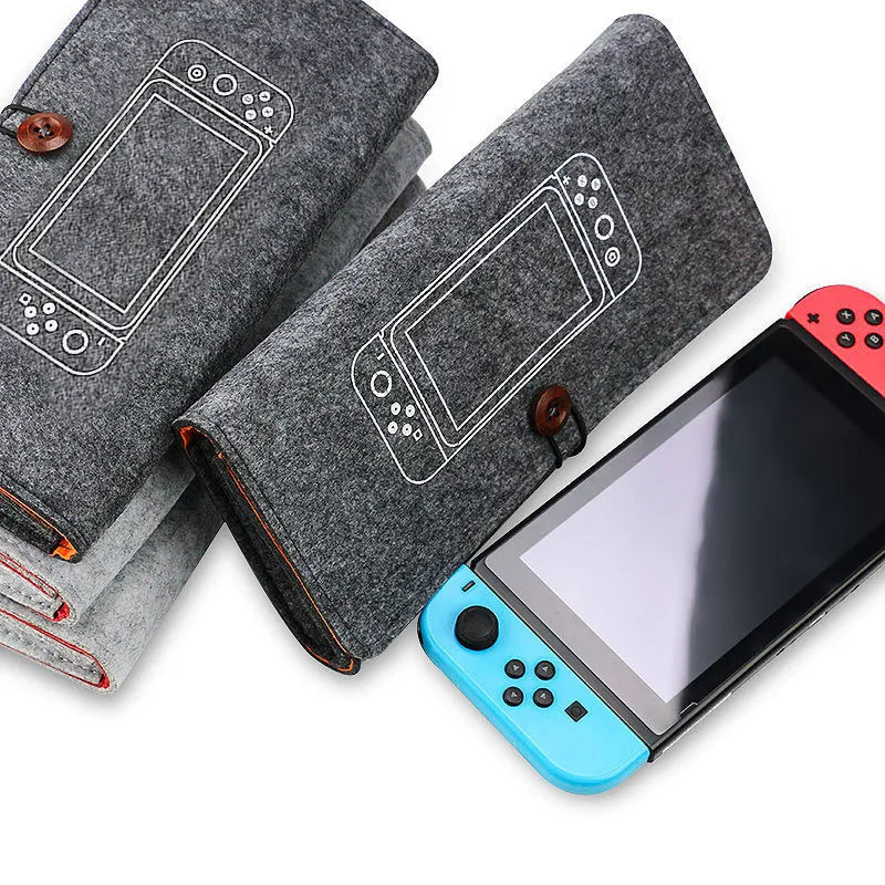 Black felt Nintendo Switch pouch showing game card slots and double storage layers