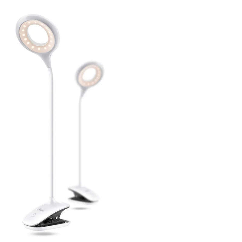 Green USB rechargeable LED desk lamp with touch control switch on a wooden table.