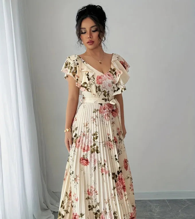 Apricot floral print dress with V-neck, ruffled short sleeves, and a high-waisted pleated swing skirt.