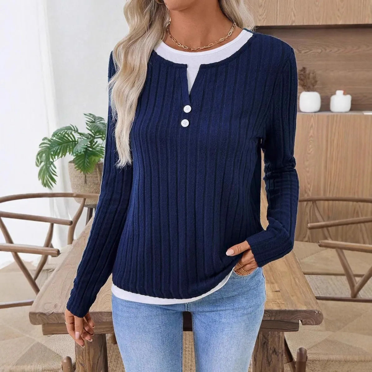 Women's black fake two-piece button pullover sweater with concave stripe texture and long sleeves