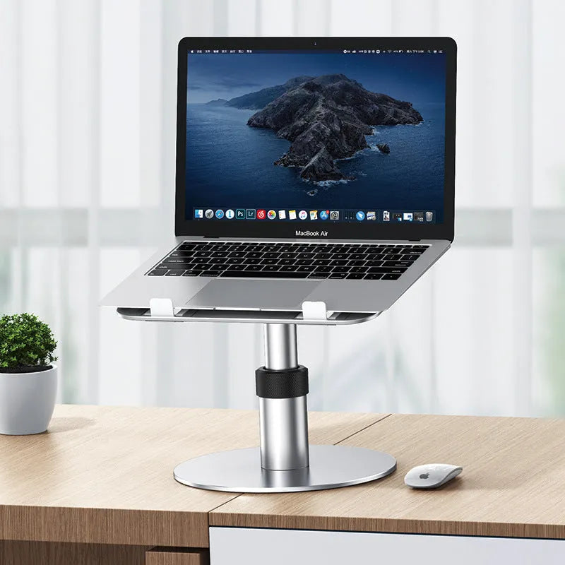 Silver aluminium laptop stand with height adjustment and rotating base for car use
