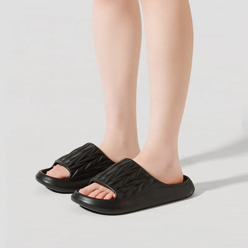 Leaf texture design EVA slippers for men and women in various colours on a white background.