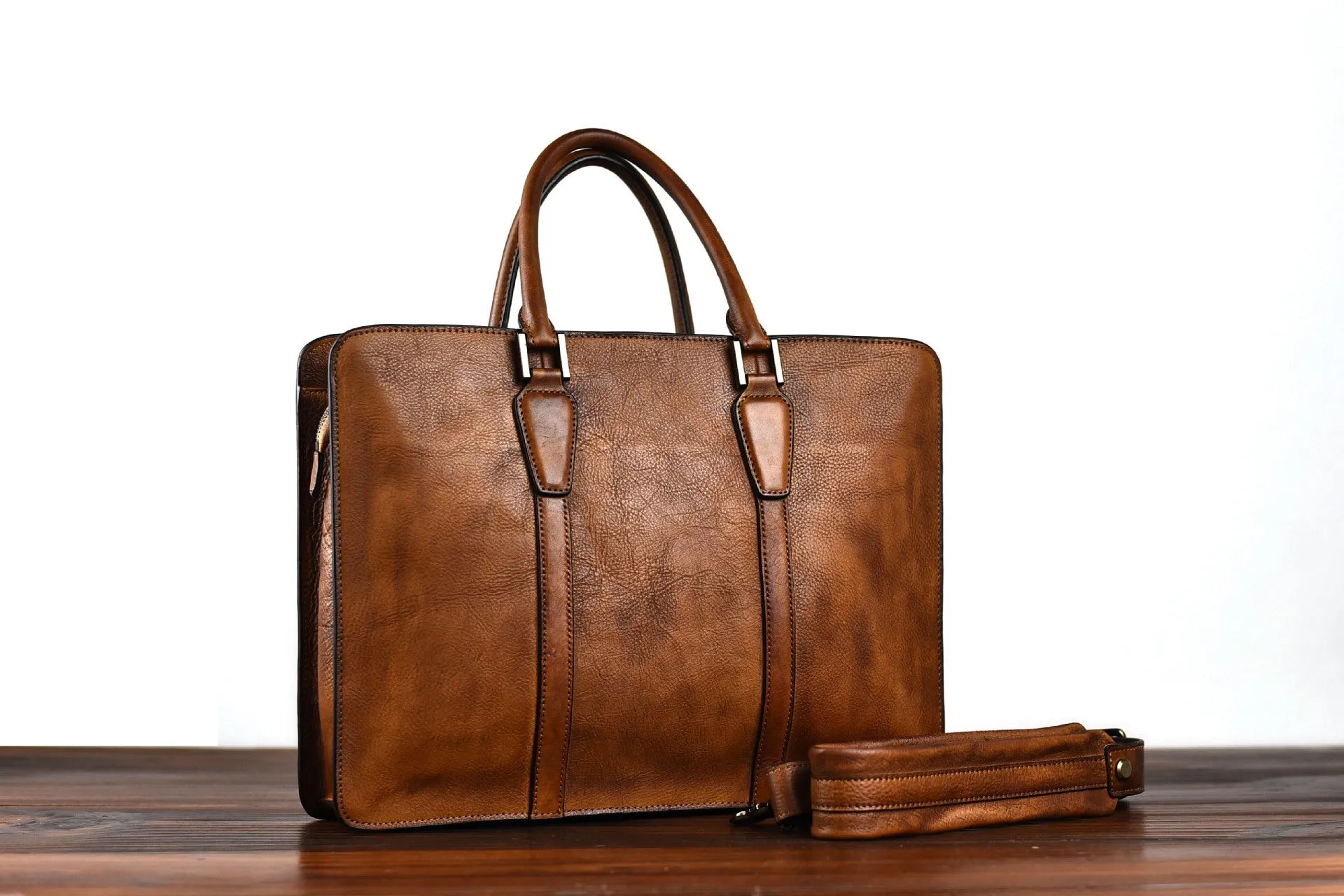 Men's khaki vegetable tanned leather horizontal square handbag with zipper
