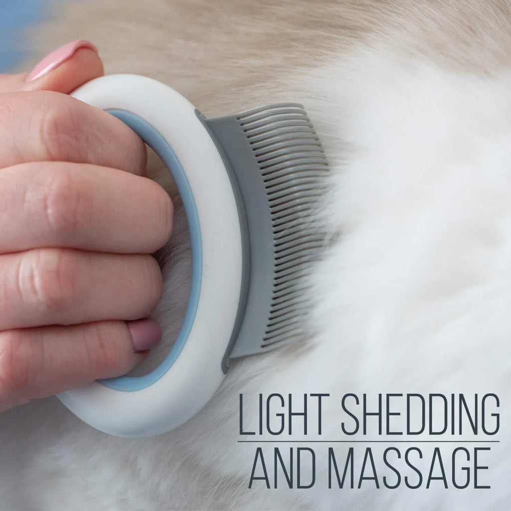 Blue pet grooming comb for cats and dogs with deshedding teeth on plastic handle