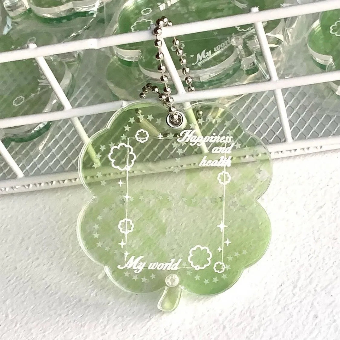 Acrylic four-leaf clover phone pendant keychain in blue, green, or mint