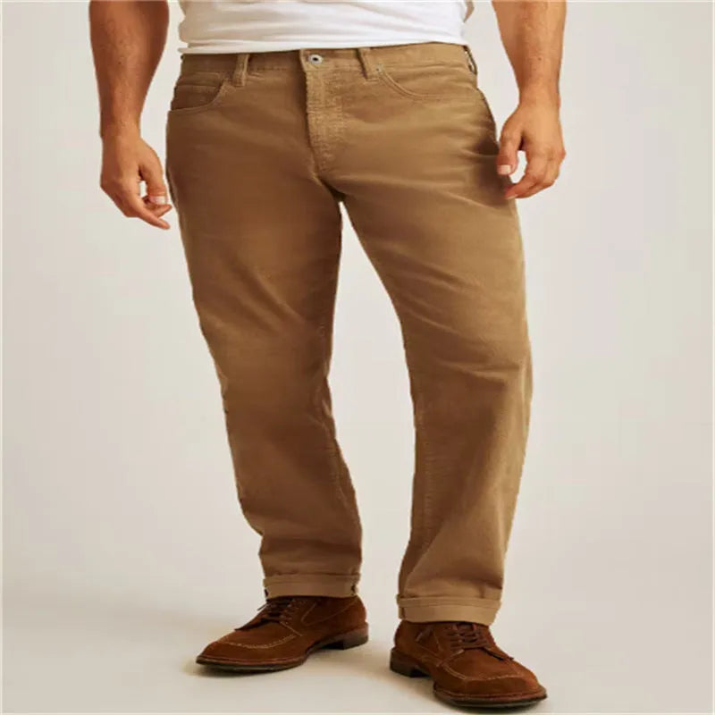 Straight-leg corduroy trousers in green colour with mid-waist styling and zip fly opening