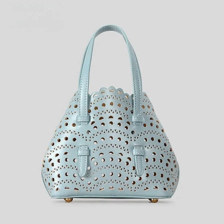 Hollow carved pattern tote messenger bag in horizontal square shape with three strap points