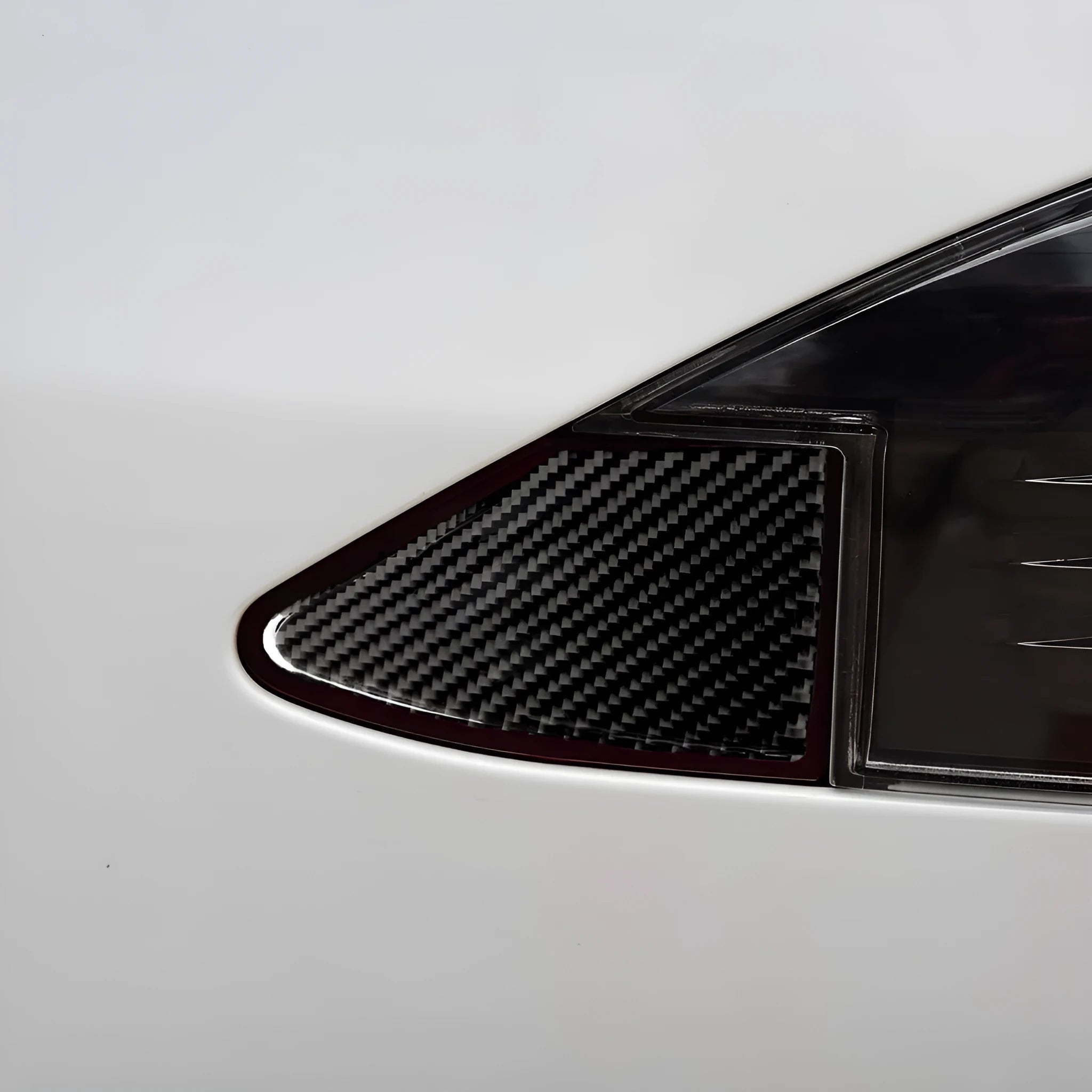 Carbon fibre USB charging port panel decorative sticker with 3M adhesive backing.