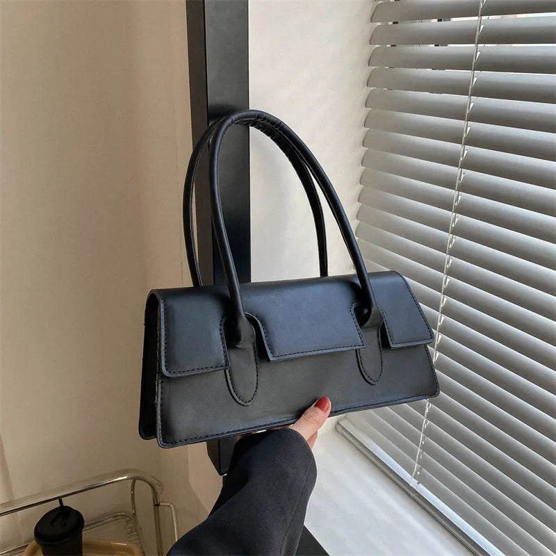 Women's retro square PU shoulder bag with stitching details and sandwich pocket exterior