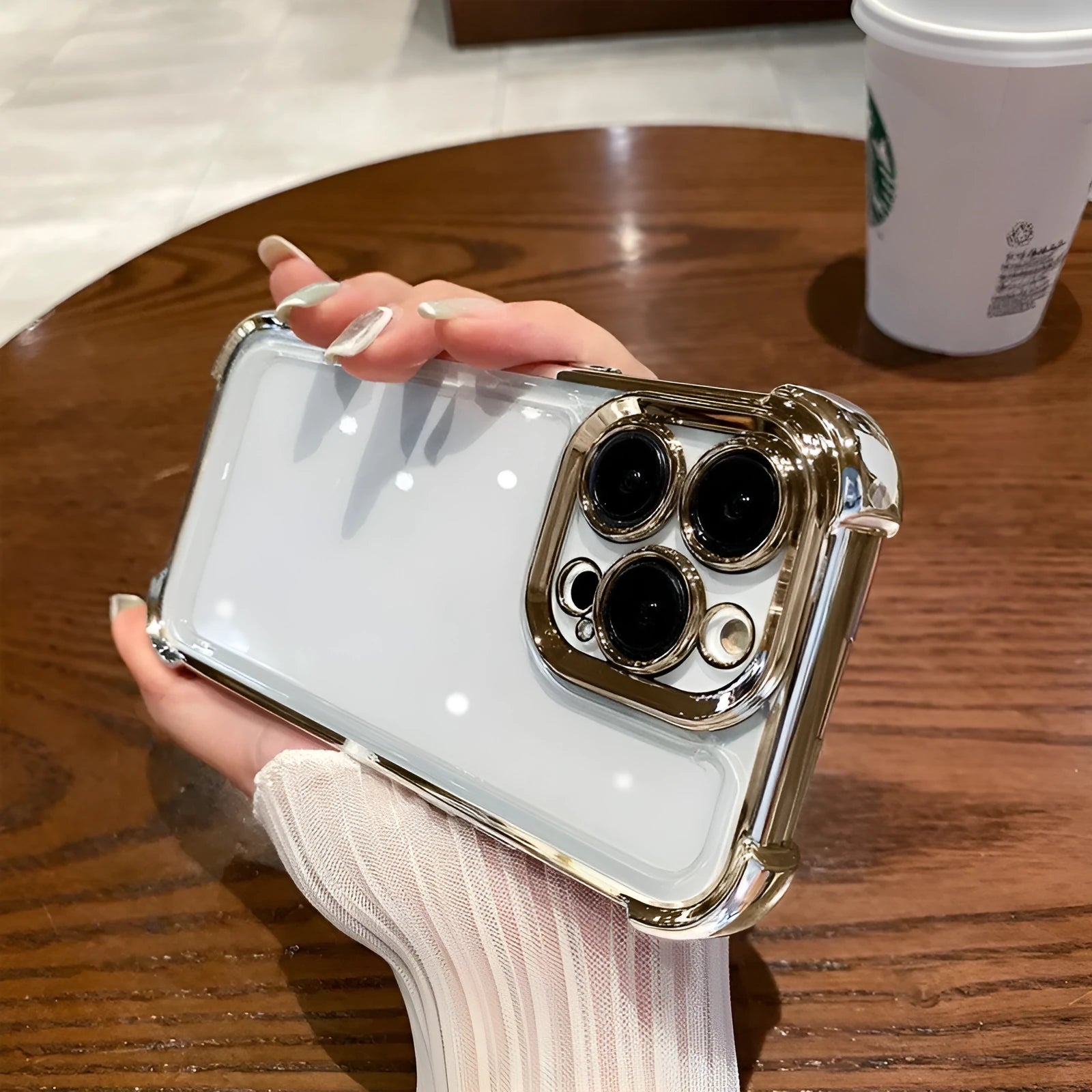 Four-corner drop-resistant PC phone case with transparent electroplated finish for iPhone, black colour option