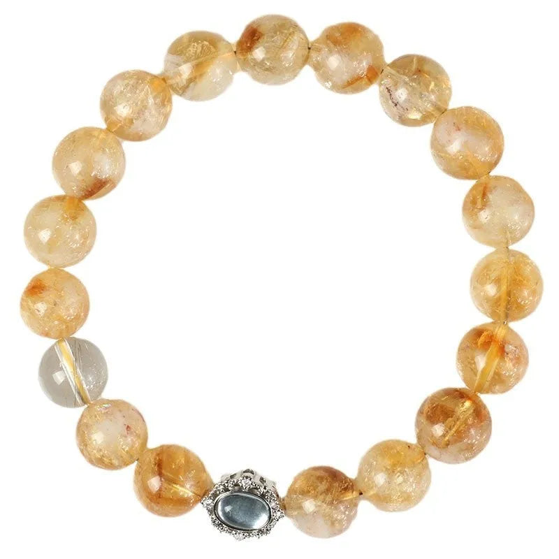 Geometric citrine crystal bracelet with 10mm stones on a wrist.