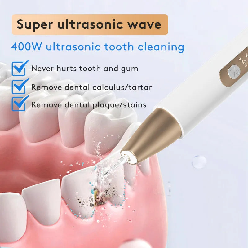 Gold-coloured ultrasonic tooth cleaning device for tartar and stain removal