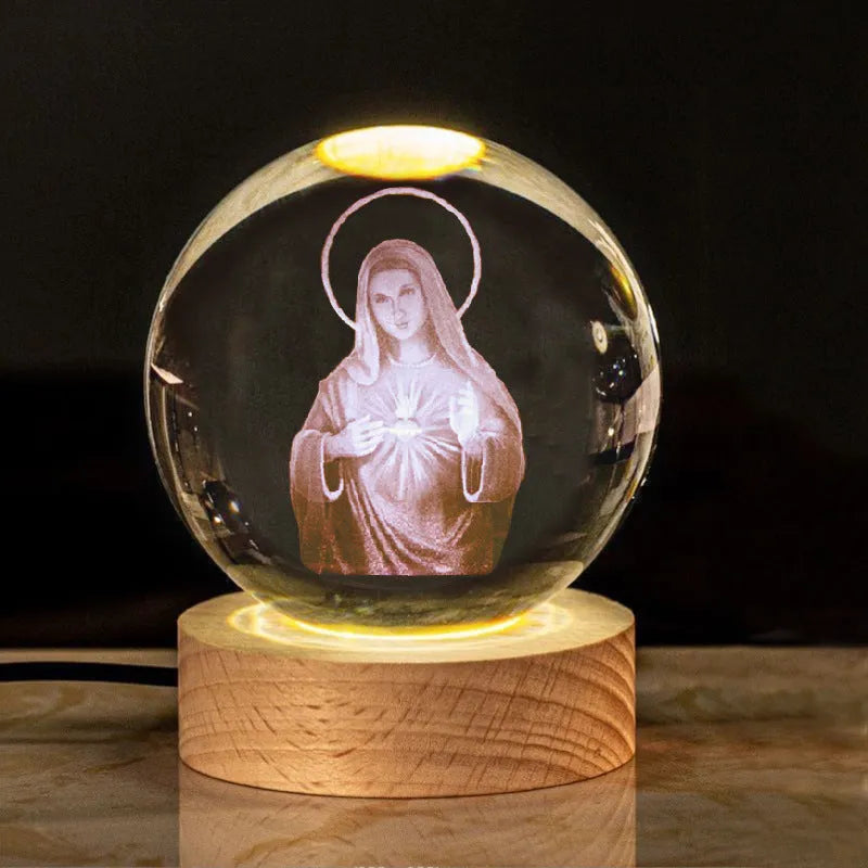 Clear white 6cm crystal ball desk ornament on wooden LED base showing Christian symbol insert