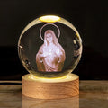 Clear white 6cm crystal ball desk ornament on wooden LED base showing Christian symbol insert