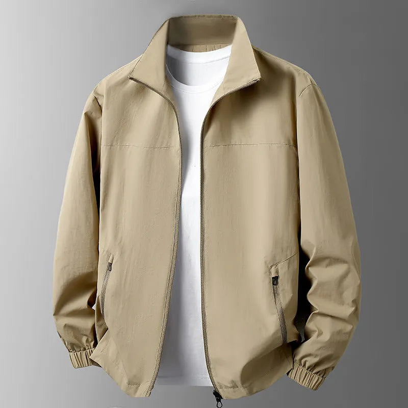 Large size men's casual stand collar zipper windproof jacket in black, front view on model