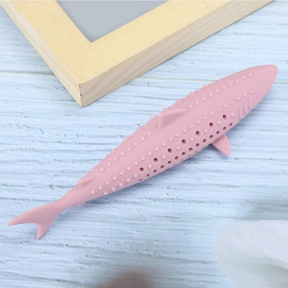 Green silicone fish-shaped chew toy for cats with side holes for catnip scent