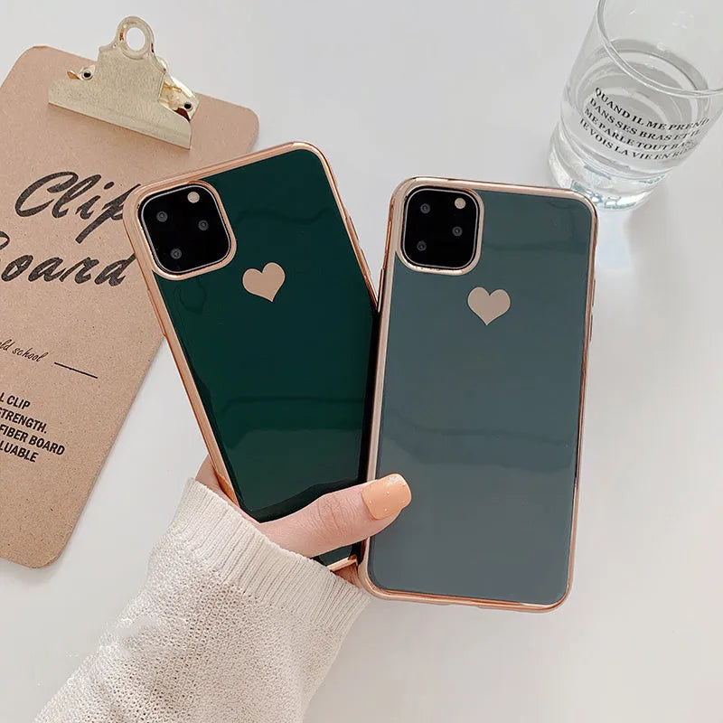 Clear solid colour TPU back cover case for iPhone on a table, shown in blue.