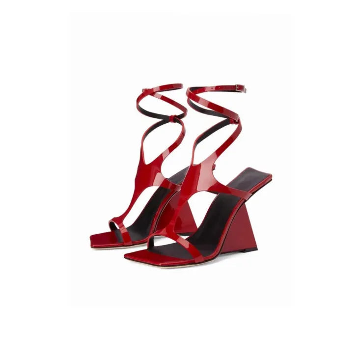 Women's square-toe high-heel sandals with buckle fastening in black colour showing 9.5cm heel