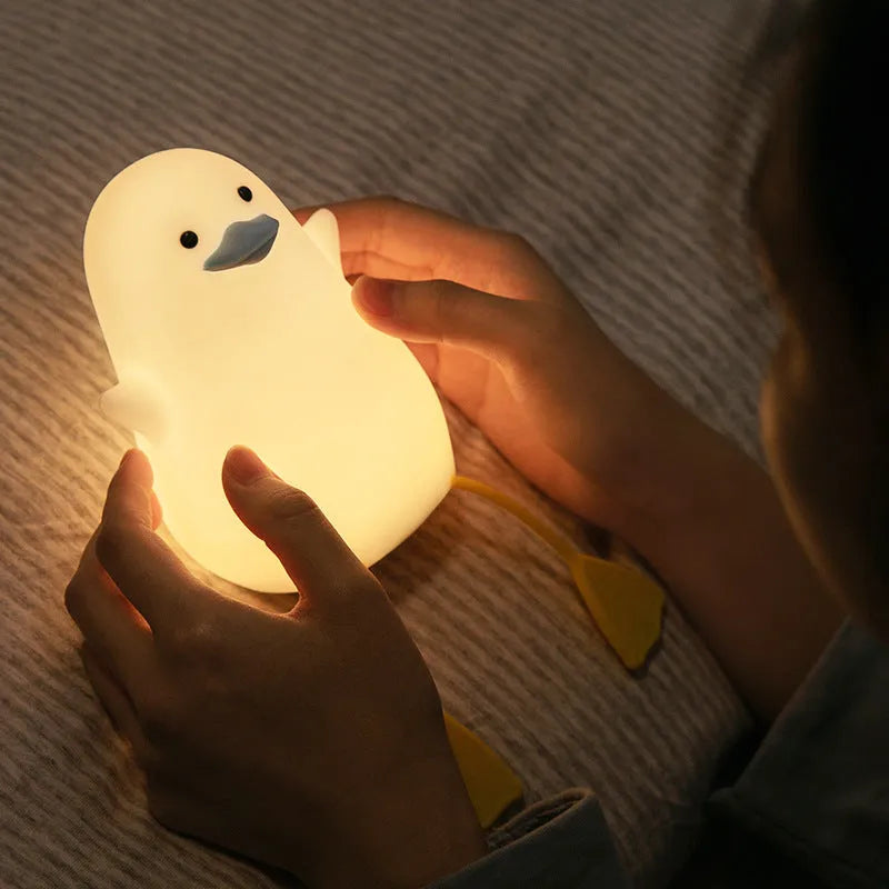 Seagull silicone night light in yellow with soft warm glow, compact size fits nursery bedside