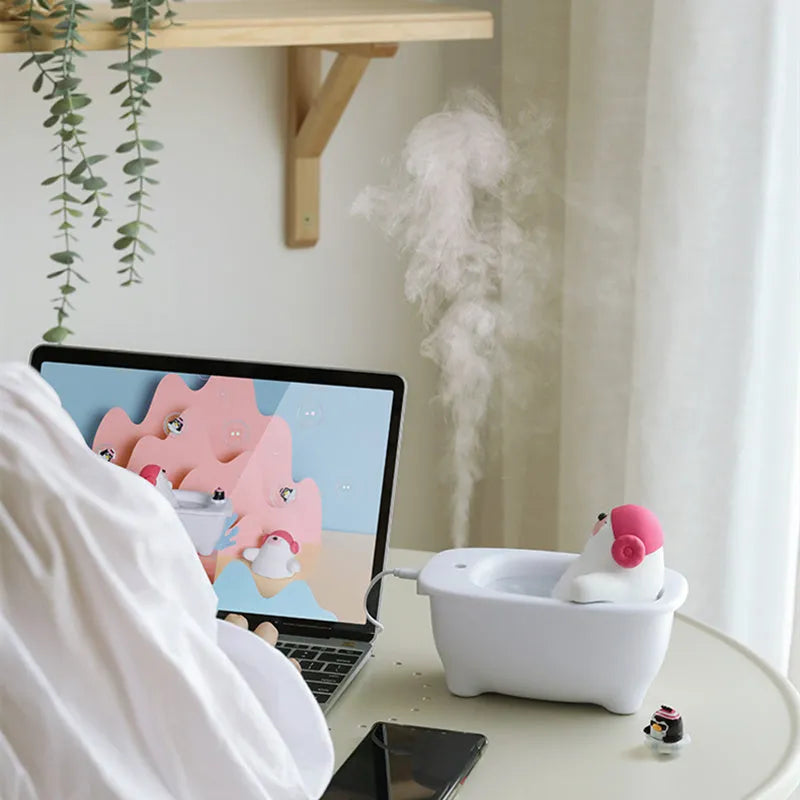 White USB desktop humidifier with 550ml water tank on wooden desk