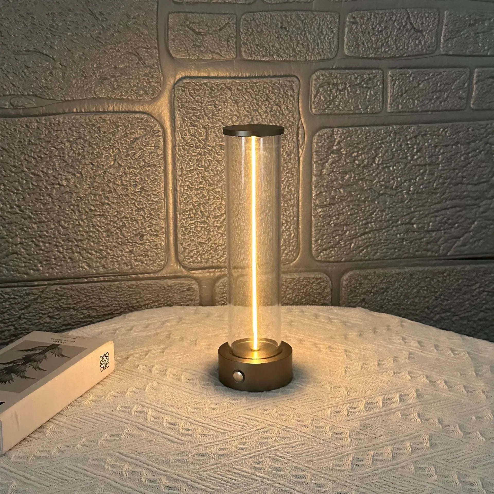 Slender white USB LED light strip with magnetic base on a metal surface