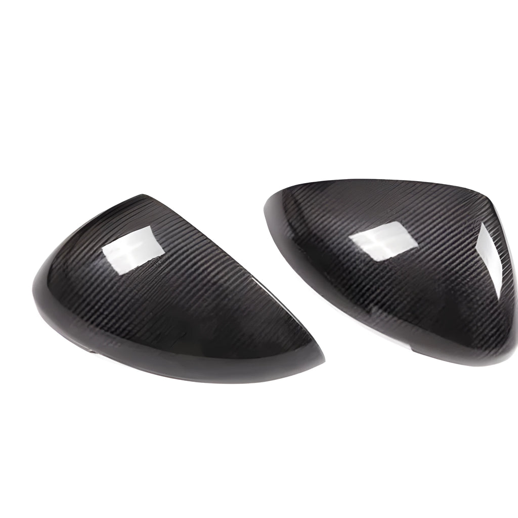 Pair of matte black true carbon fibre rearview mirror covers for a Porsche Macan.