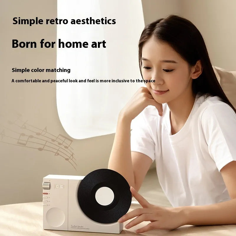 Mini Bluetooth portable speaker in obsidian black, ivory white, coral pink or plum green colours with USB charging