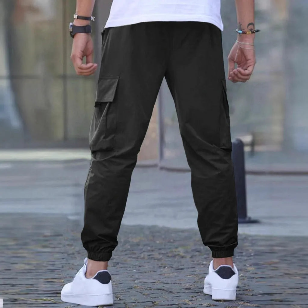 Solid colour polyester fibre workwear casual track pants with drawstring elastic waist, available in multiple colours