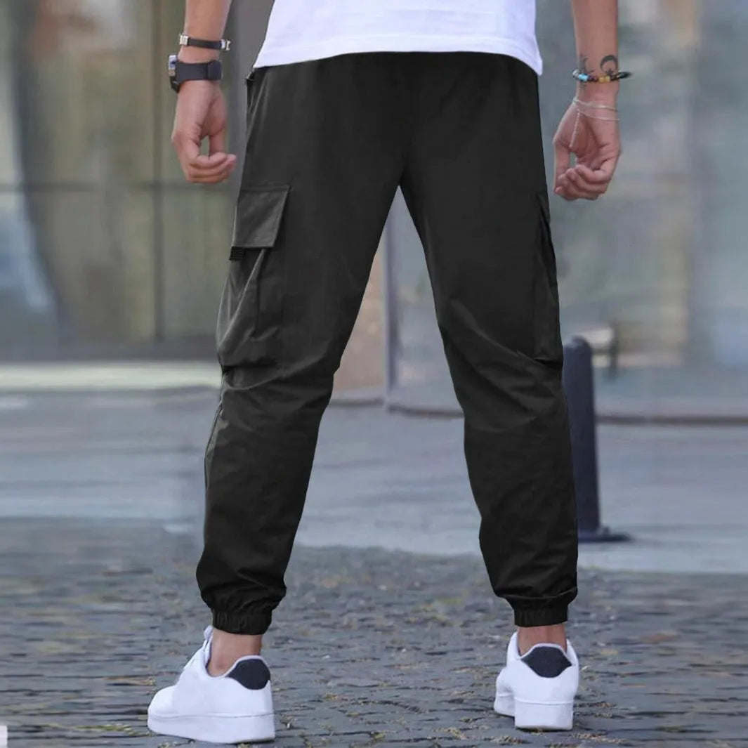 Solid colour polyester fibre workwear casual track pants with drawstring elastic waist, available in multiple colours