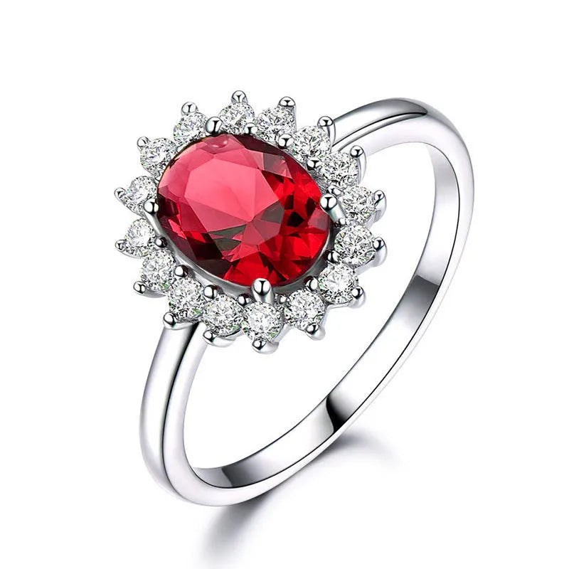 Women's copper ring with flower shape and zirconium inlay, electroplated finish in green, sapphire blue, or pomegranate red.