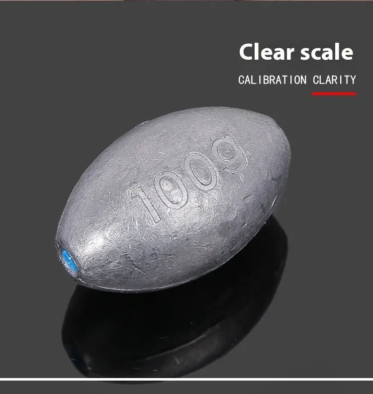 Close-up of a rugby-shaped olive lead fishing sinker with a Tongxin scale pattern texture.