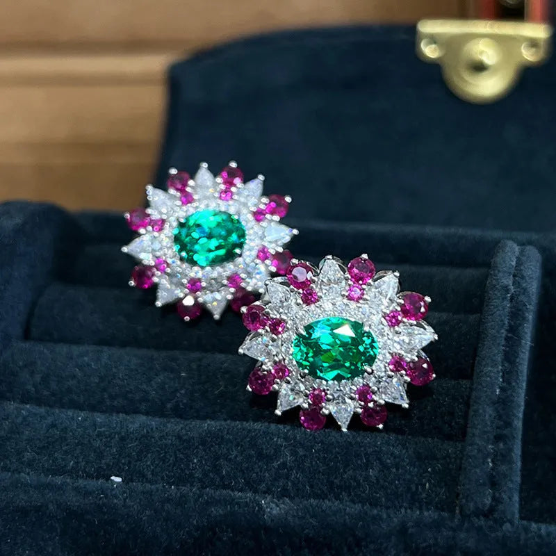 White gold stud earrings with oval zircon stone and geometric floral design on copper base