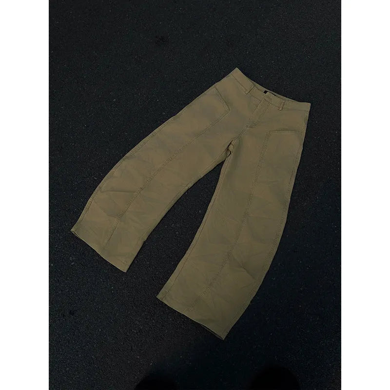 Men's khaki straight leg cotton trousers laid flat, showcasing the casual American retro style.