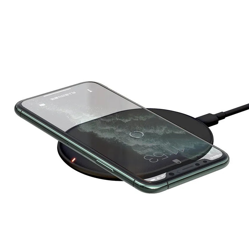 Baseus Rough 15W wireless charging pad in black and white on a table