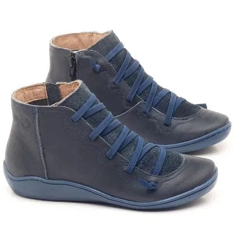 Women's round-toe casual booties with a wedge heel in artificial PU, shown in multiple colours.