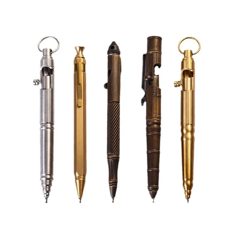 Solid brass bolt-action tactical pen with machine gun design on a dark surface.