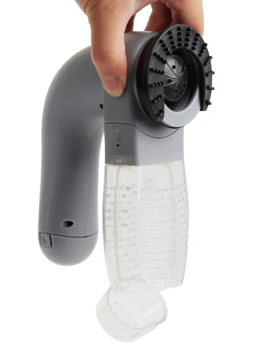 Gray handheld electric pet hair vacuum cleaner with rubber grooming head.