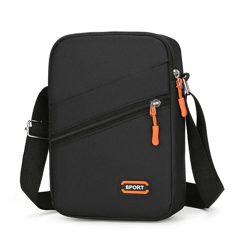 Lightweight Oxford cloth crossbody commuter bag in a solid colour with contrast detailing.