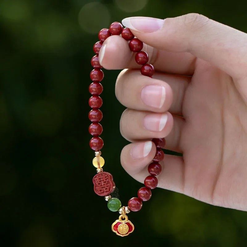Emperor sandstone bracelet with fu character charm in 6mm and 8mm size options.