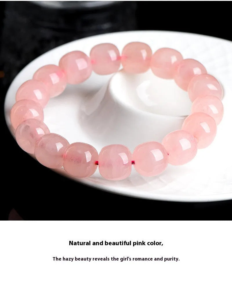 Pink natural crystal bracelet with barrel shaped beads in geometric design