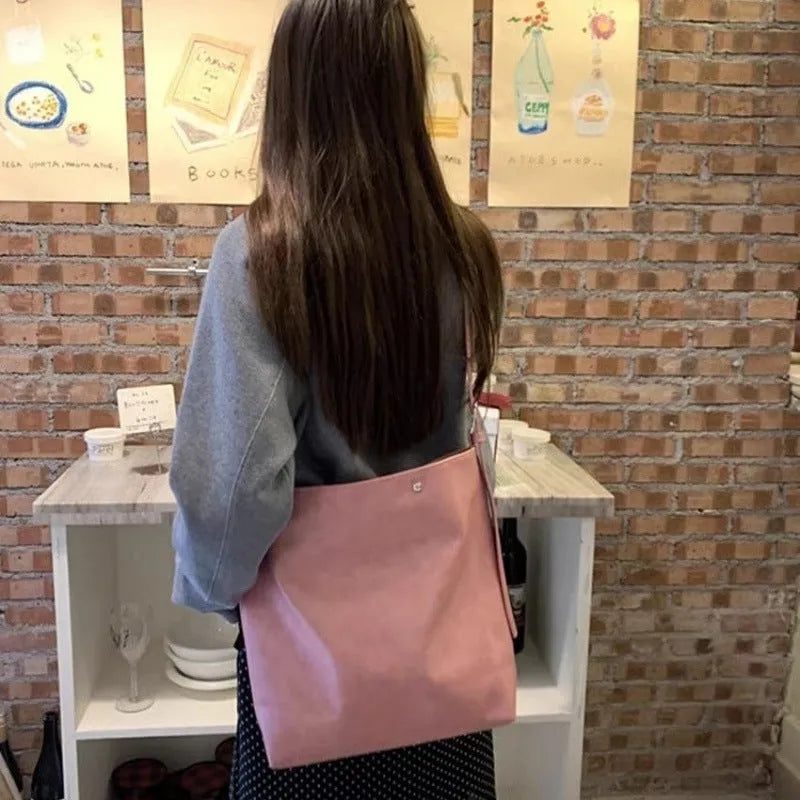 Corduroy one-shoulder commuter bag in pink or brown colour options