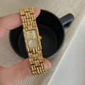 Women's mid-century inspired bracelet watch with 15mm dial and butterfly clasp in silver and gold colour options