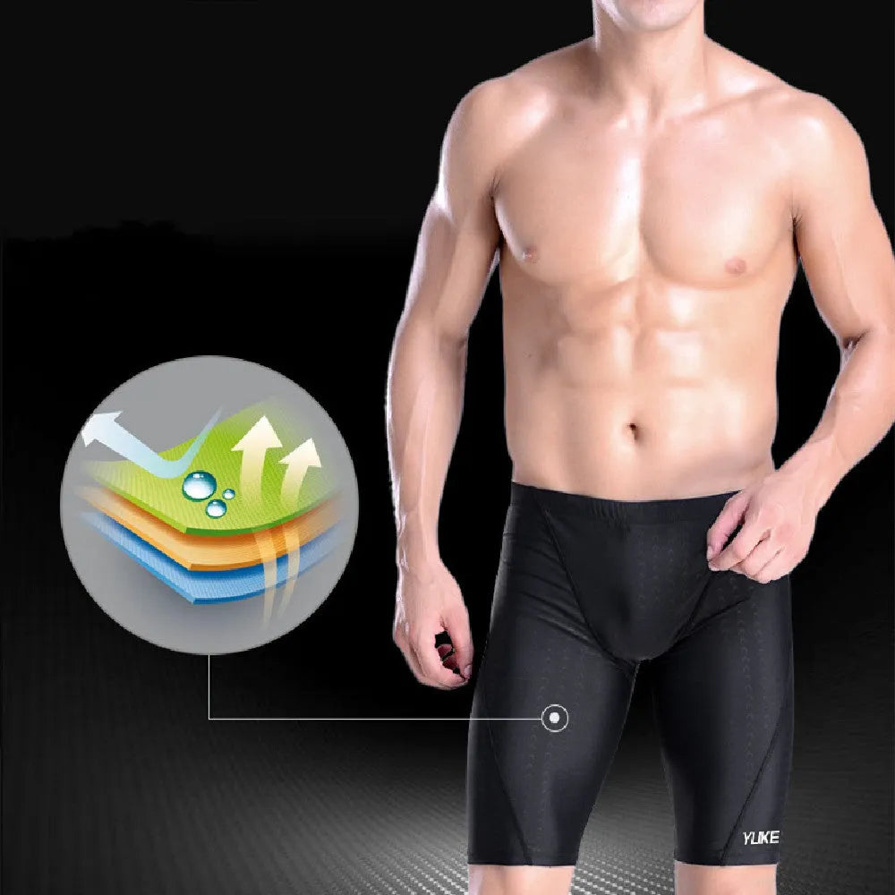 Men's black five-piece swimming set with trunks, goggles, waterproof cap, earplugs, nose clip, and carry bag.