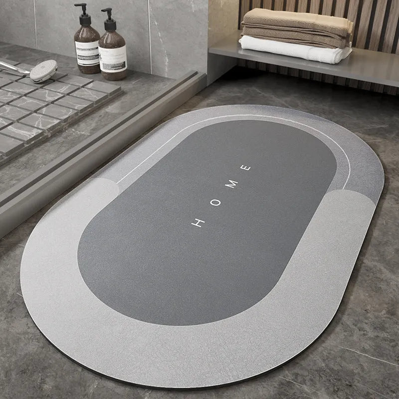 Bathroom floor mat in blue colour, oval shape, showing machine-woven blended texture