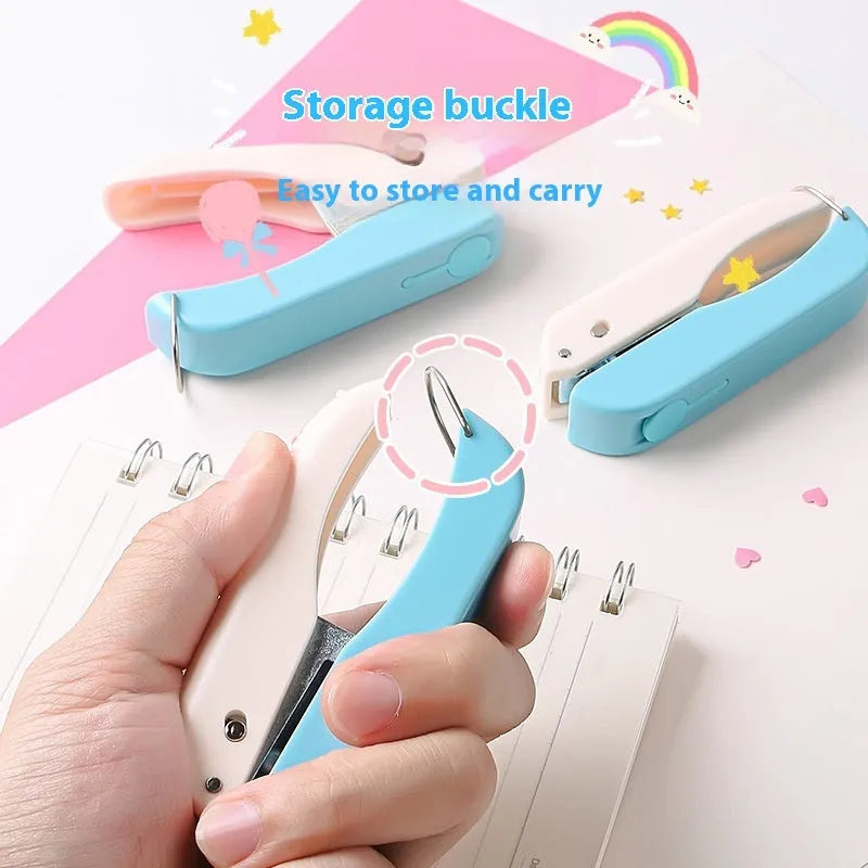 Small manual embossing punching machine with love, star, and round pattern discs for paper crafts.